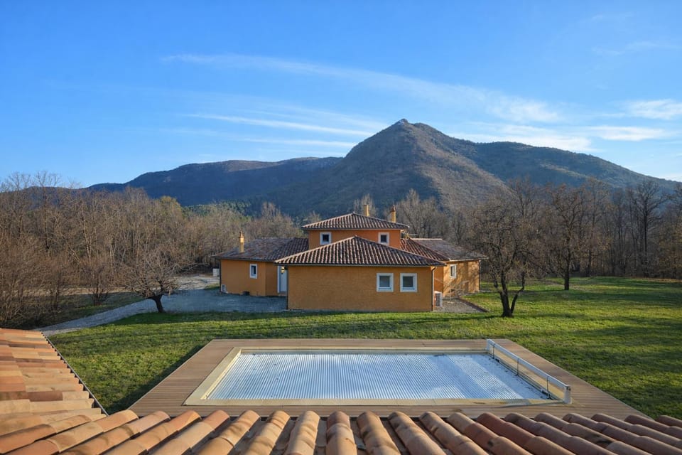 Property building, Nearby landmark, Spring, Day, Natural landscape, Garden, Mountain view, Pool view, Swimming pool
