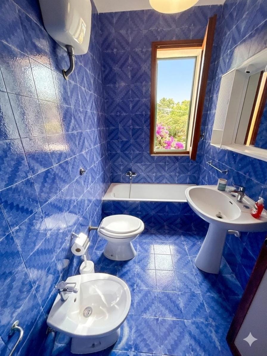 Villa Rosa House in Baia Verde