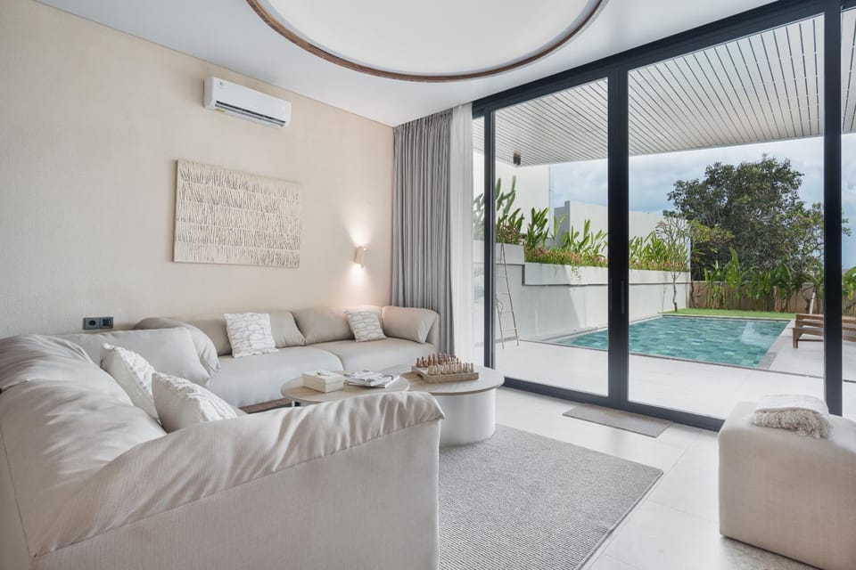 Living room, Seating area, Pool view