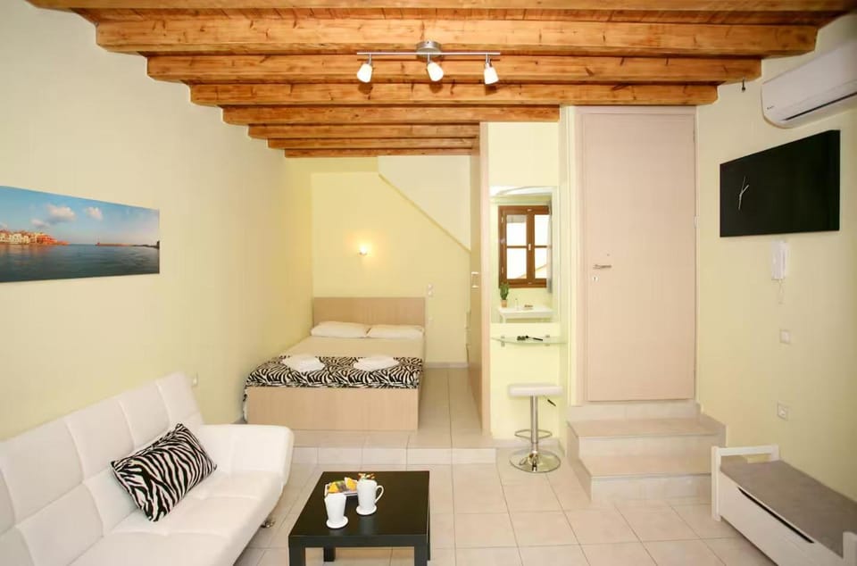Bed, Living room, Seating area, Bedroom