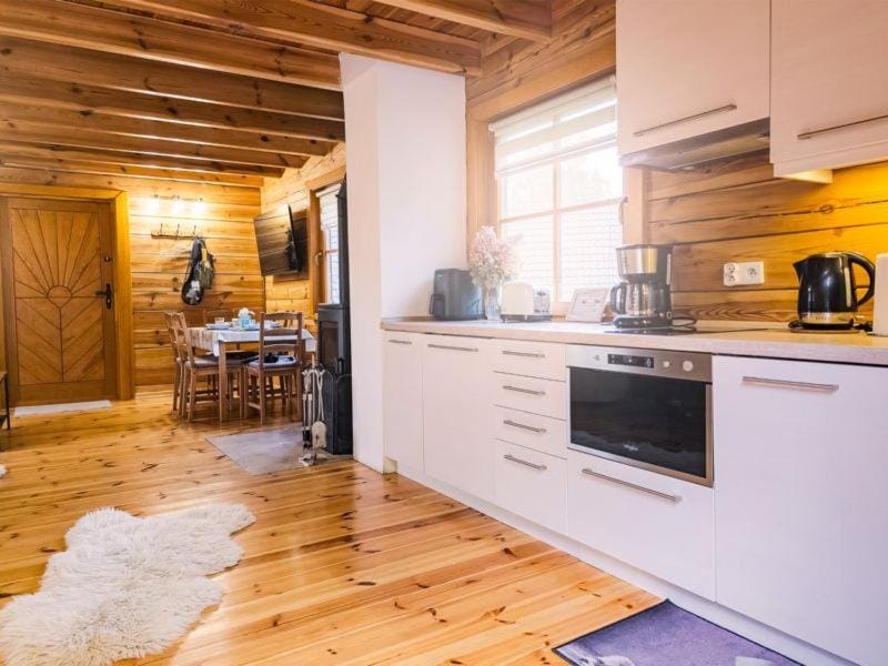 Kitchen or kitchenette, dishwasher, oven, stove, toaster