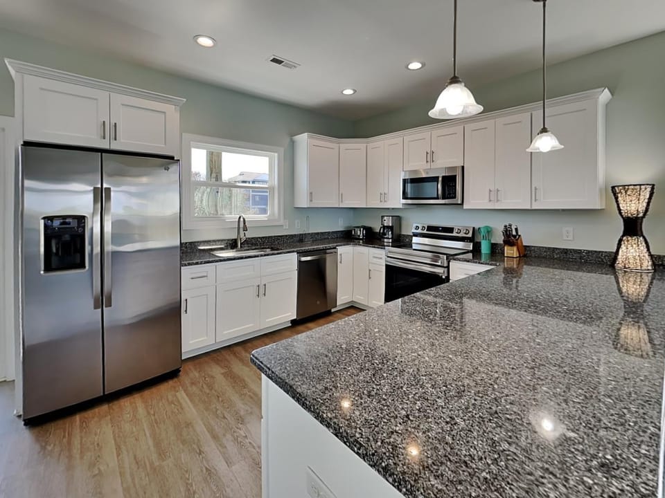 Kitchen or kitchenette, microwave, oven, stove, toaster, kitchen