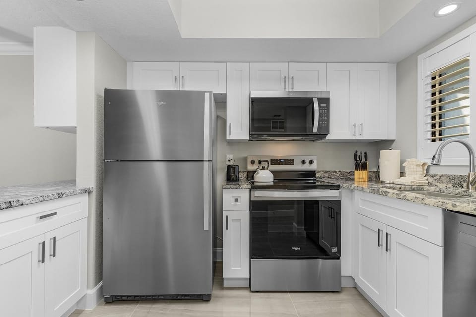 Kitchen or kitchenette, furniture, microwave, oven, stove