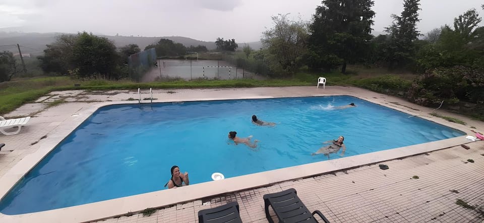 Property building, Living room, Swimming pool