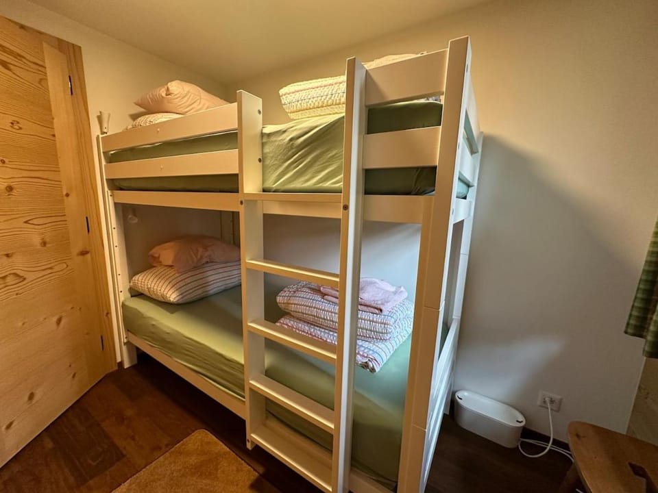 Bed, Bedroom, bunk bed, towels, wardrobe