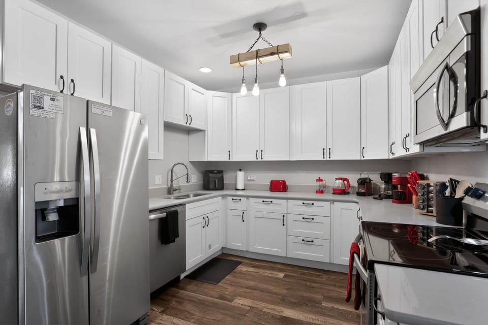Kitchen or kitchenette, dishwasher, microwave, oven, stove, kitchen