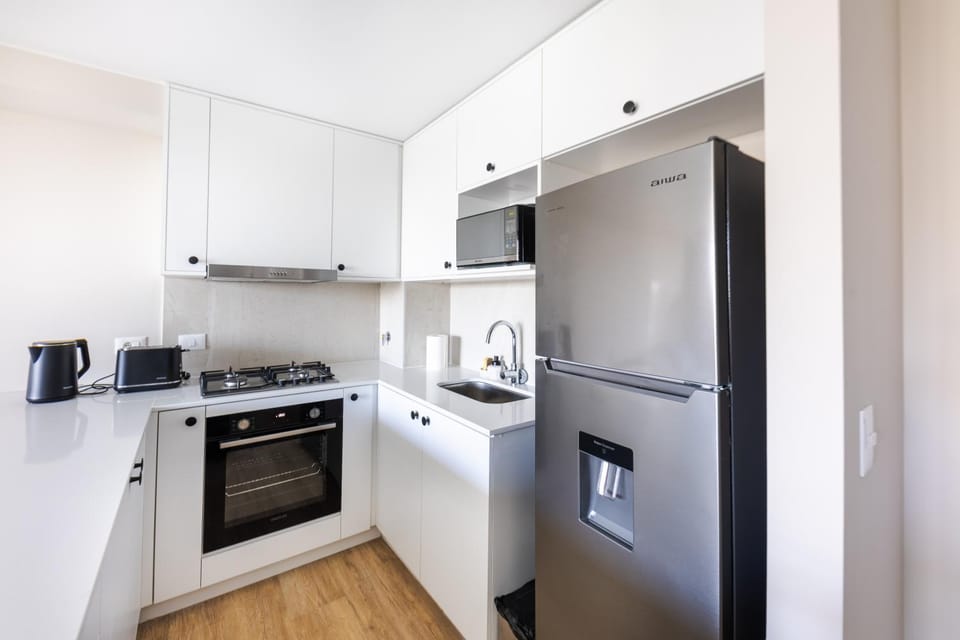 Kitchen or kitchenette, oven, toaster