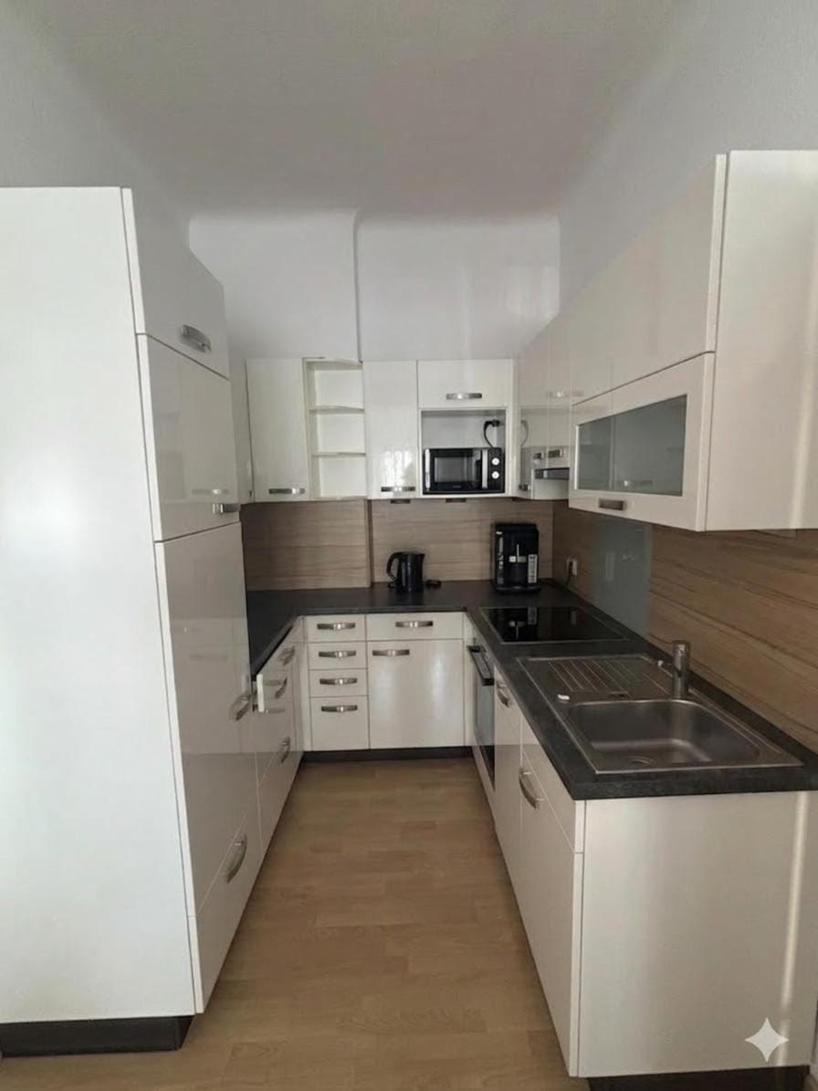 Kitchen or kitchenette, dishwasher, oven, stove