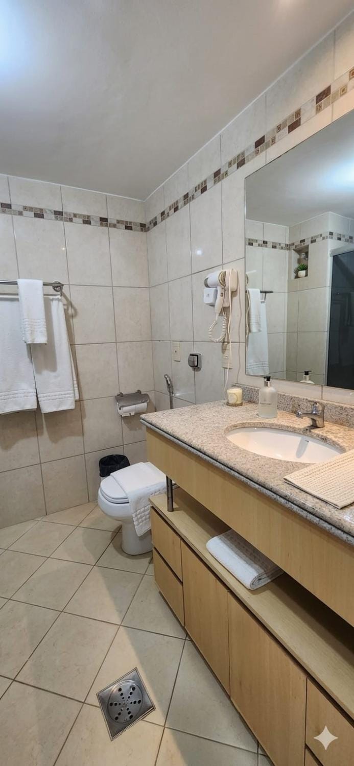 Bathroom, hair dryier, towels