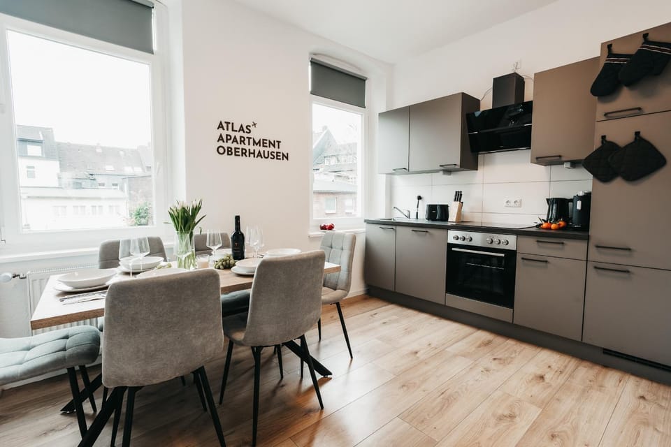 Day, Property logo or sign, Coffee/tea facilities, Kitchen or kitchenette, Seating area, Dining area, Logo/Certificate/Sign, Entertainment, Time of day, Family, Family, dishwasher, heating, heating, oven, stove, toaster, kitchen, kitchen