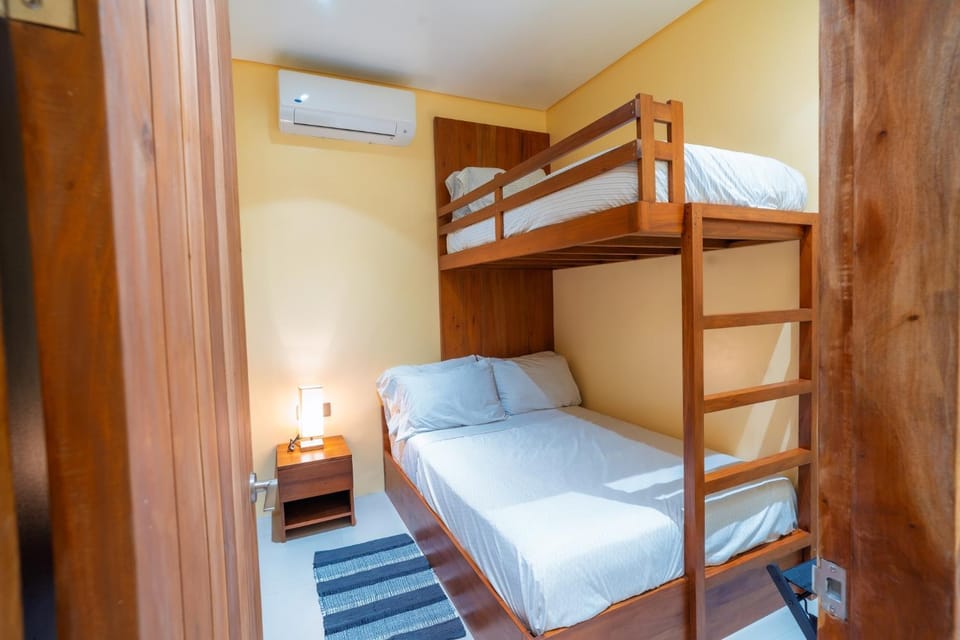 Bed, Photo of the whole room, Bedroom, bunk bed, wardrobe, air conditioner