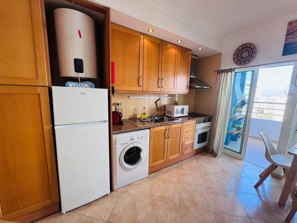Kitchen or kitchenette, Living room, oven, toaster, washing machine