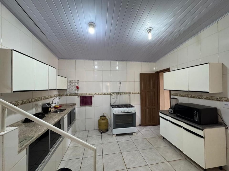 Kitchen or kitchenette, oven, stove