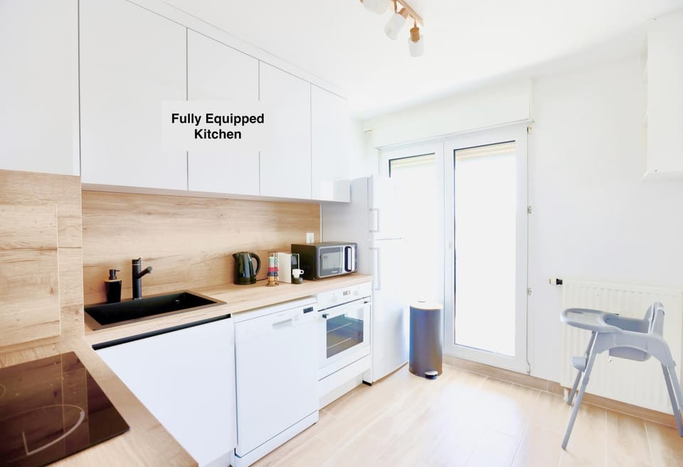 Kitchen or kitchenette, dishwasher, microwave, oven