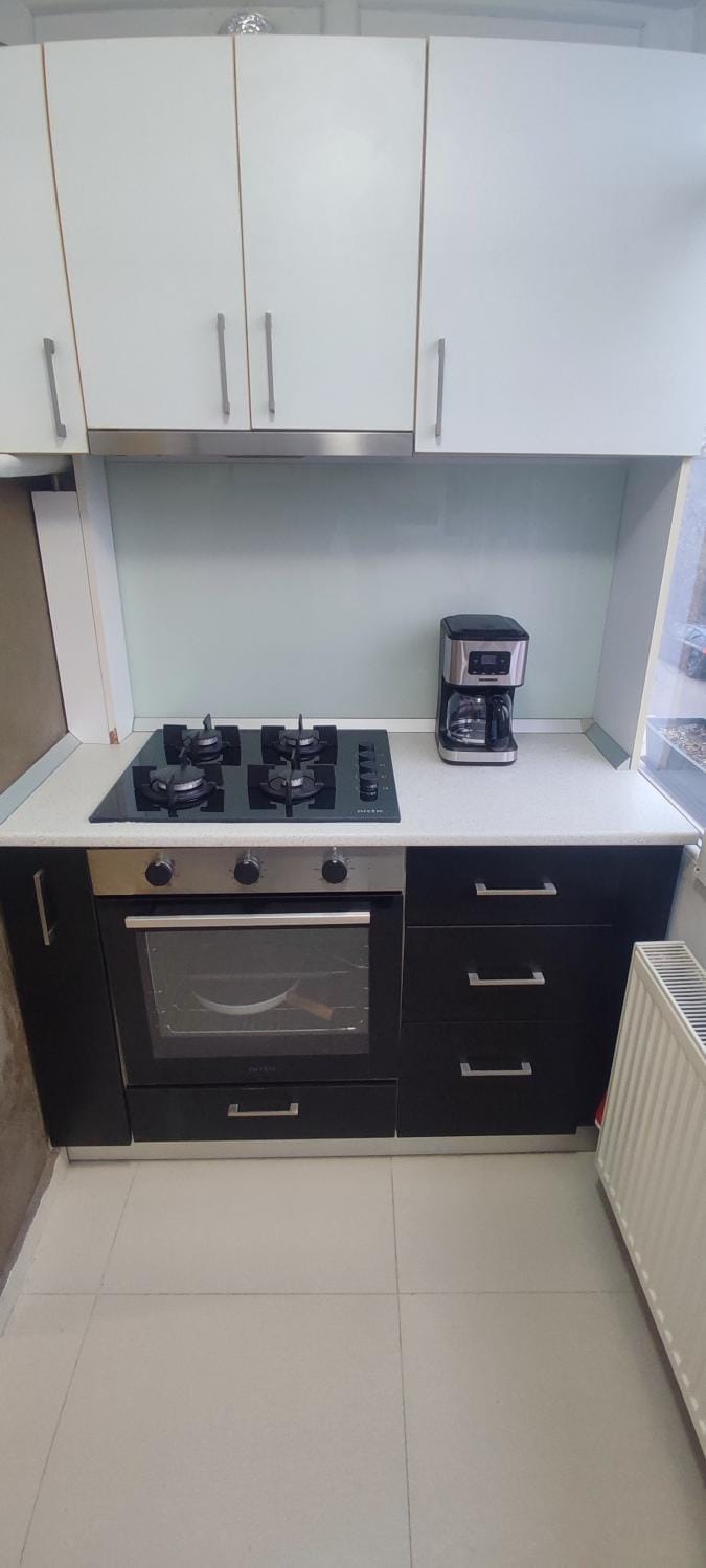Kitchen or kitchenette, stove