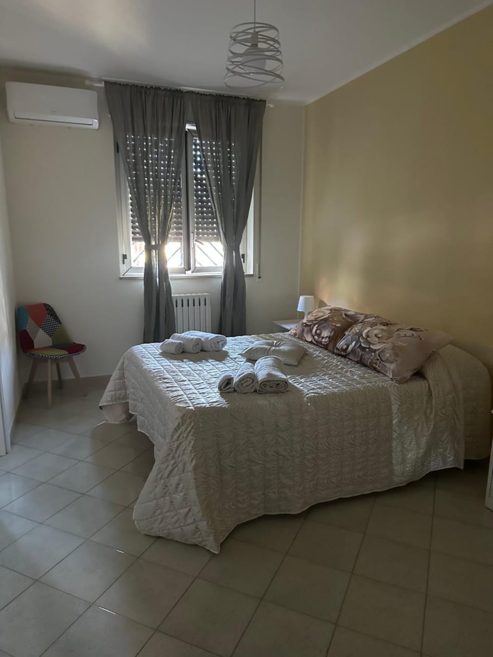 Bed, Photo of the whole room, Bedroom, towels, air conditioner