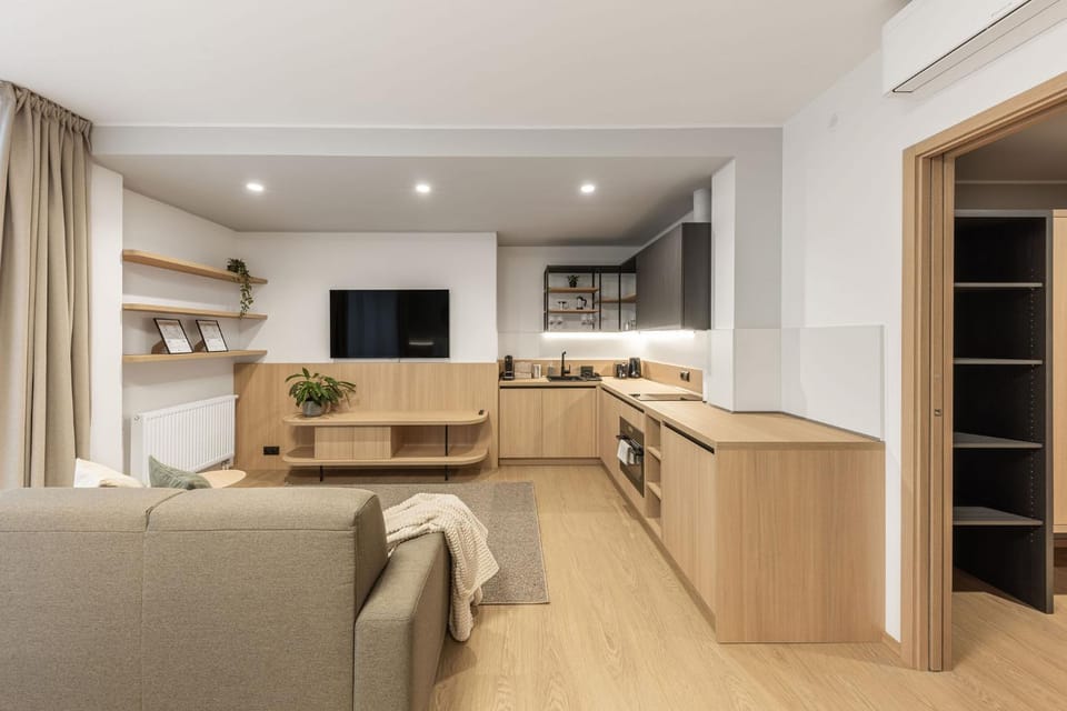 TV and multimedia, Coffee/tea facilities, Kitchen or kitchenette, Living room, Photo of the whole room, Seating area, dishwasher, microwave, oven, toaster, air conditioner