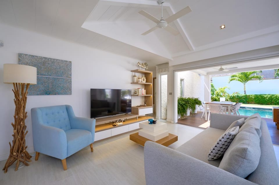TV and multimedia, Living room, Seating area, Pool view, Swimming pool