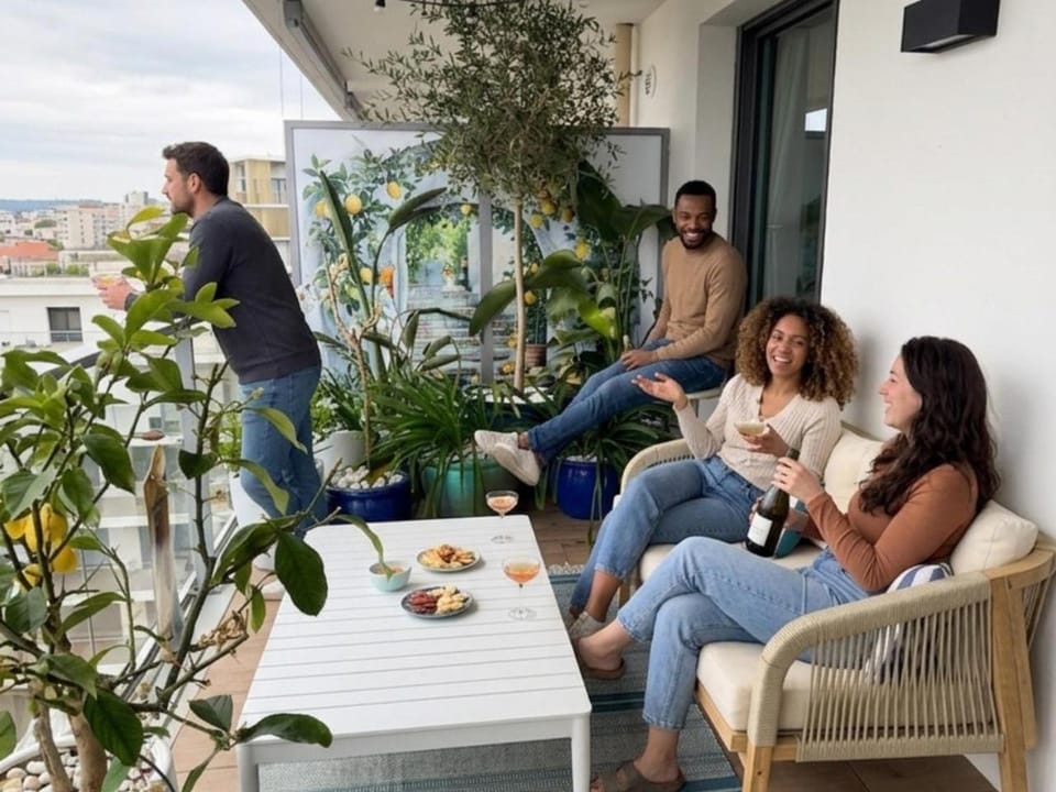 Patio, Day, People, View (from property/room), Balcony/Terrace, Living room, Seating area, Guests, group of guests