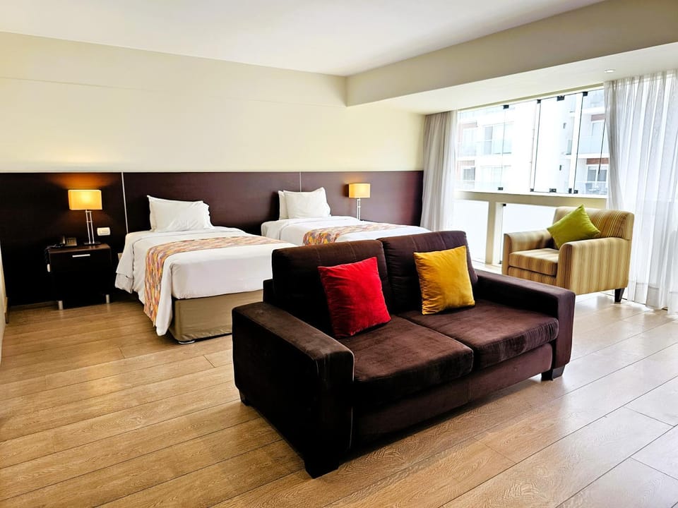 Bed, Living room, Seating area, Bedroom