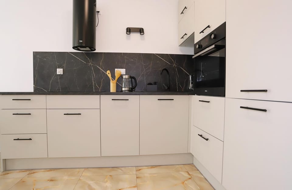 Kitchen or kitchenette, stove