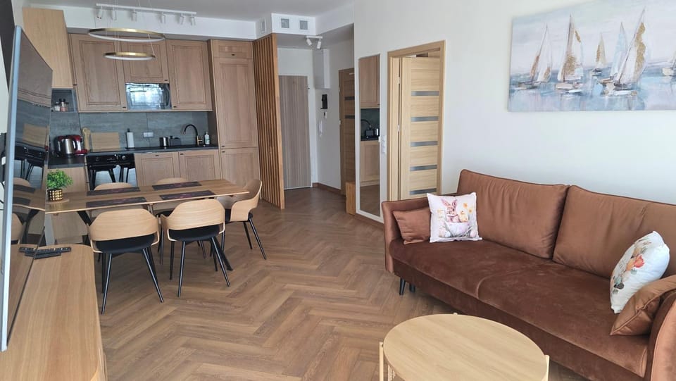 Coffee/tea facilities, Kitchen or kitchenette, Living room, Seating area, Dining area, oven, wardrobe