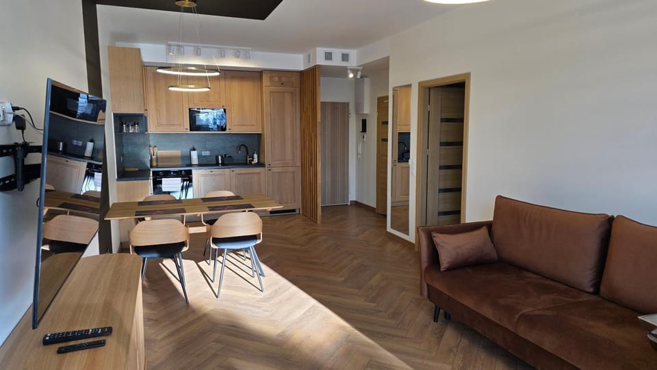 Kitchen or kitchenette, Living room, Seating area, Dining area