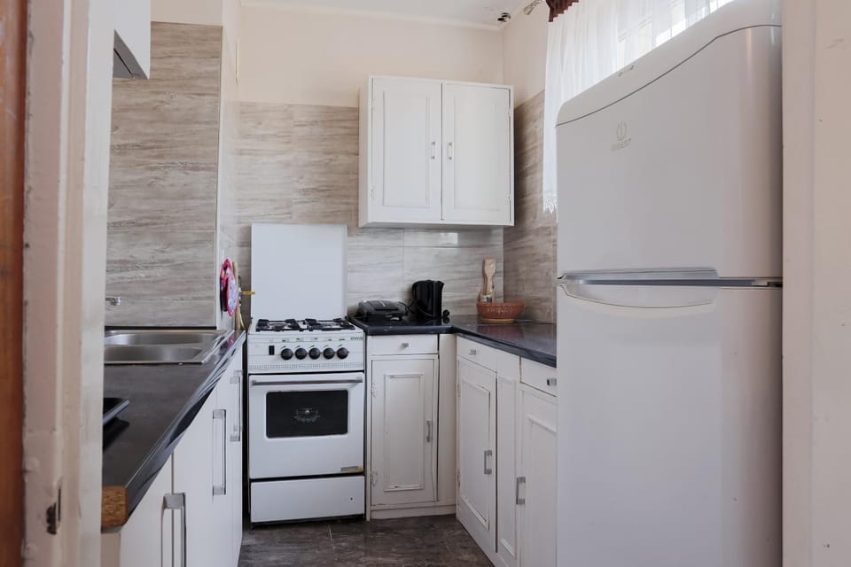 Kitchen or kitchenette, stove