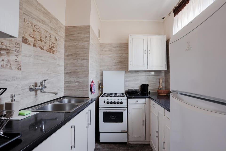 Kitchen or kitchenette, oven, stove, toaster