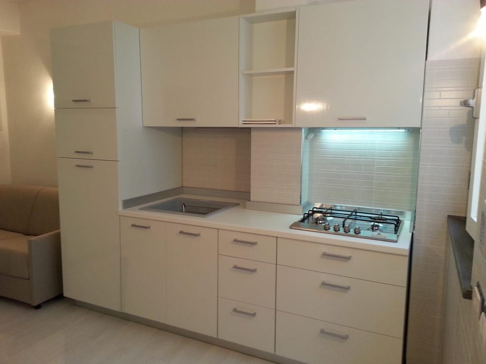 Kitchen or kitchenette, stove