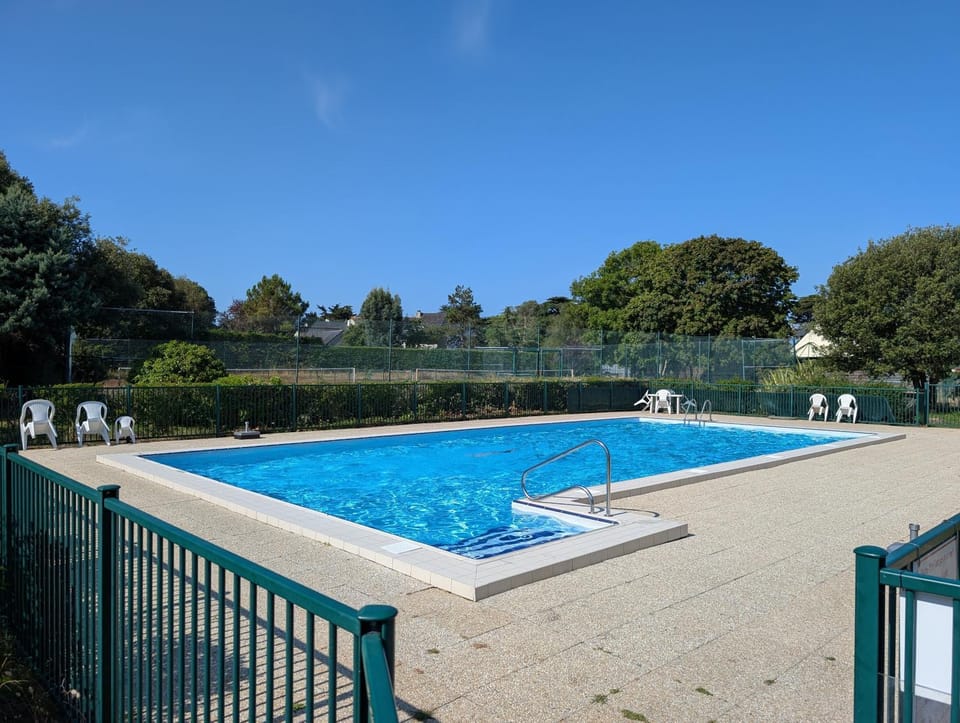 Property building, Living room, Swimming pool