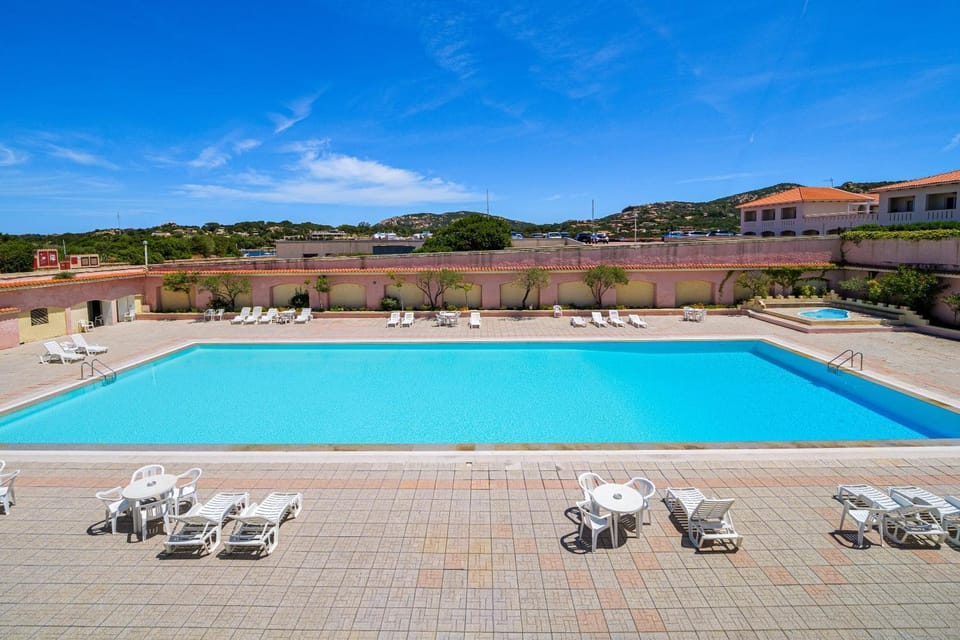 Property building, Living room, Swimming pool
