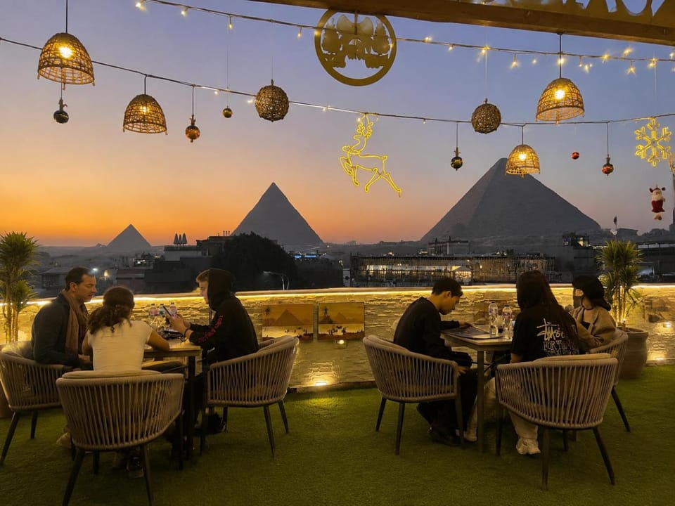Property building, Restaurant/places to eat, Restaurant/places to eat, People, Natural landscape, Banquet/Function facilities, Mountain view, Sunrise, Sunset, group of guests