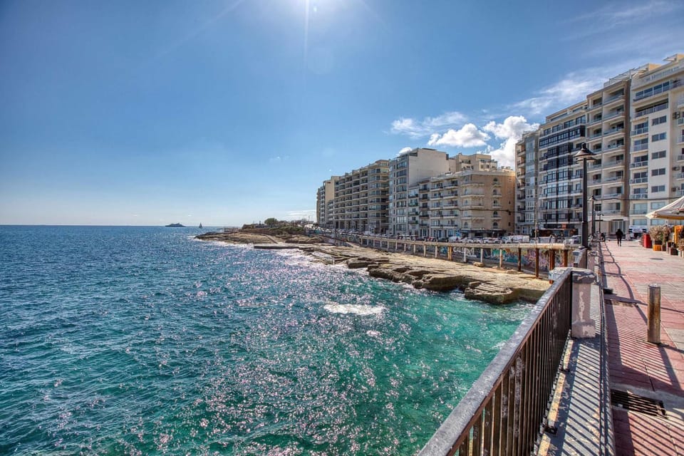 Property building, Nearby landmark, Day, Natural landscape, Beach, City view, Sea view
