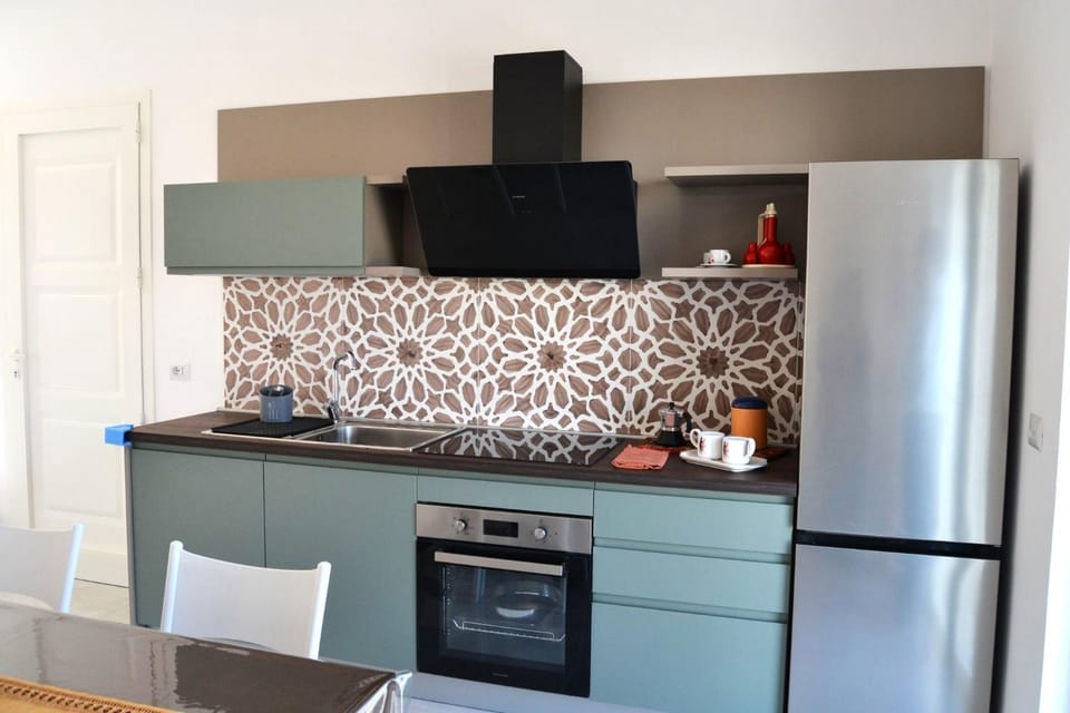 Kitchen or kitchenette, oven, stove