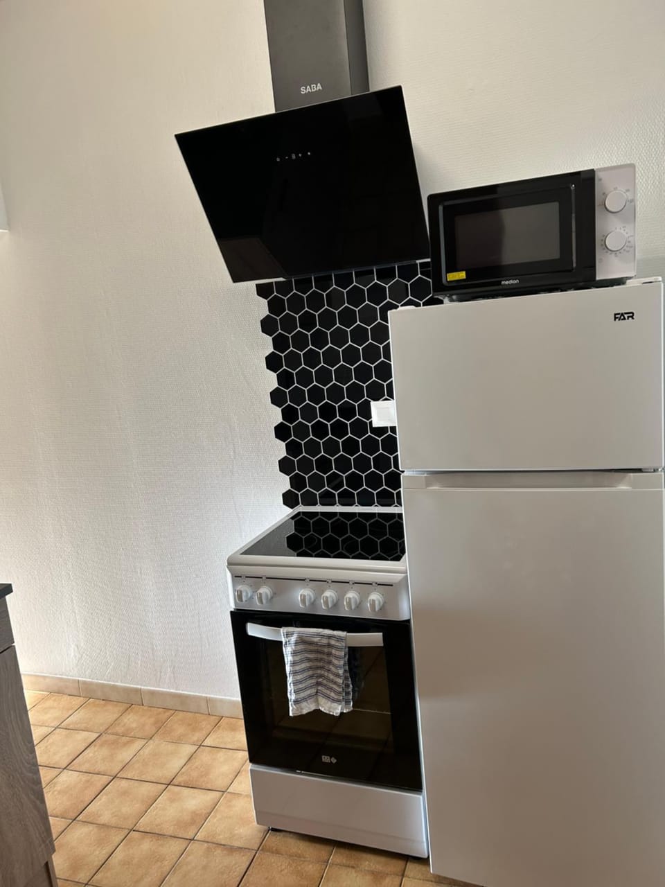 Kitchen or kitchenette, oven, stove