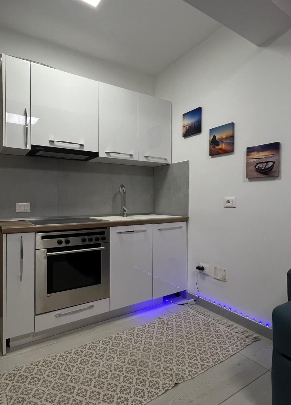 Kitchen or kitchenette, oven, storage, stove