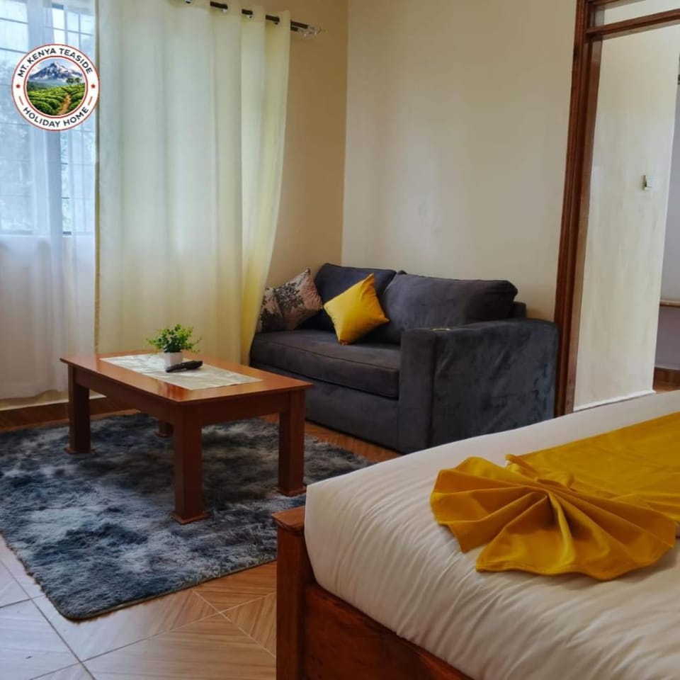 Bed, Living room, Seating area, Bedroom