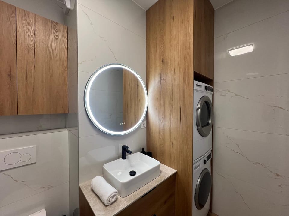 Bathroom, towels, washing machine, dryer