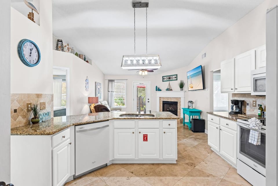 Kitchen or kitchenette, dishwasher, furniture, microwave, oven, kitchen