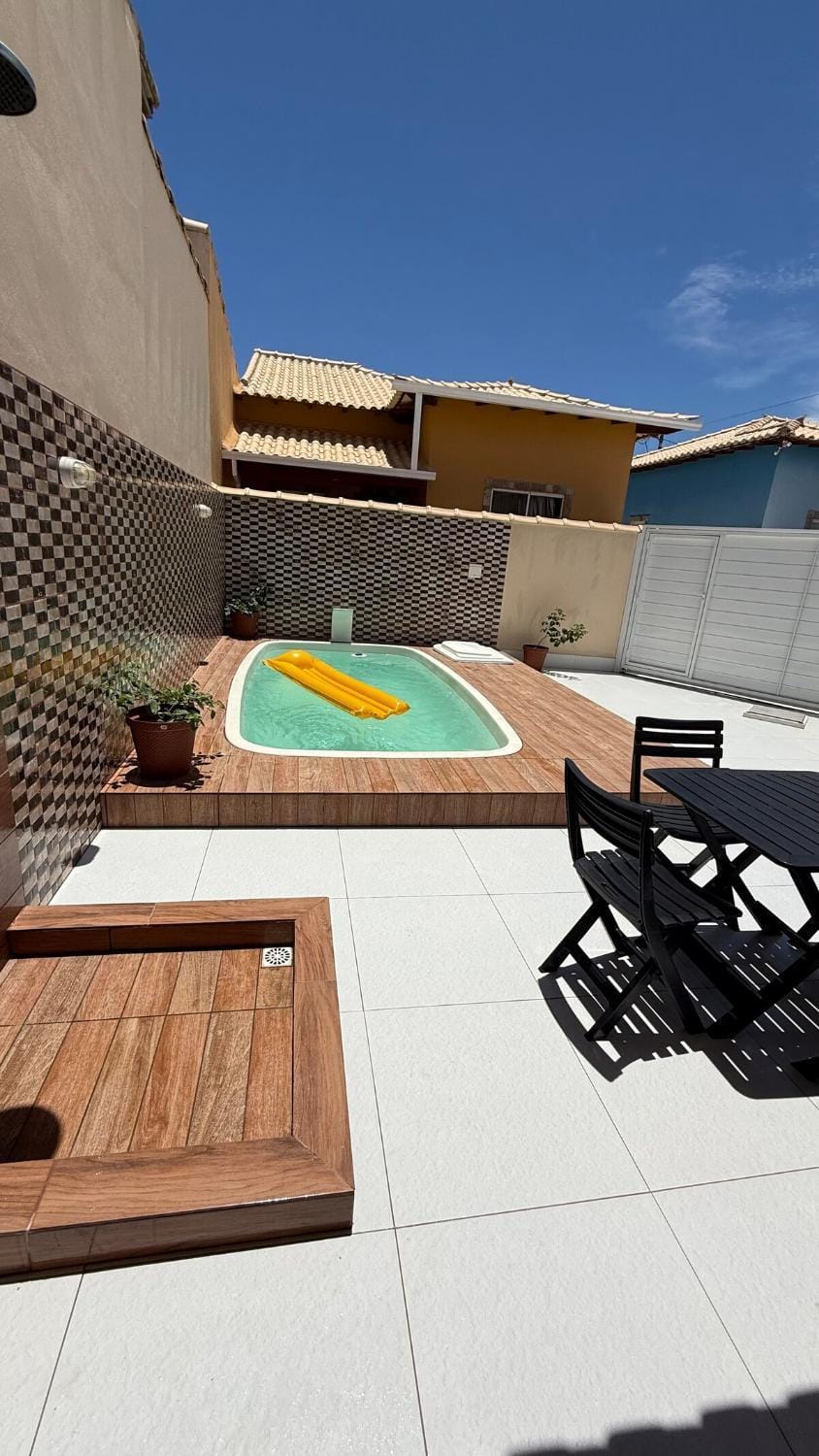 Casa com piscina a 800 metros da praia em Unamar Cabo Frio House in Cabo Frio