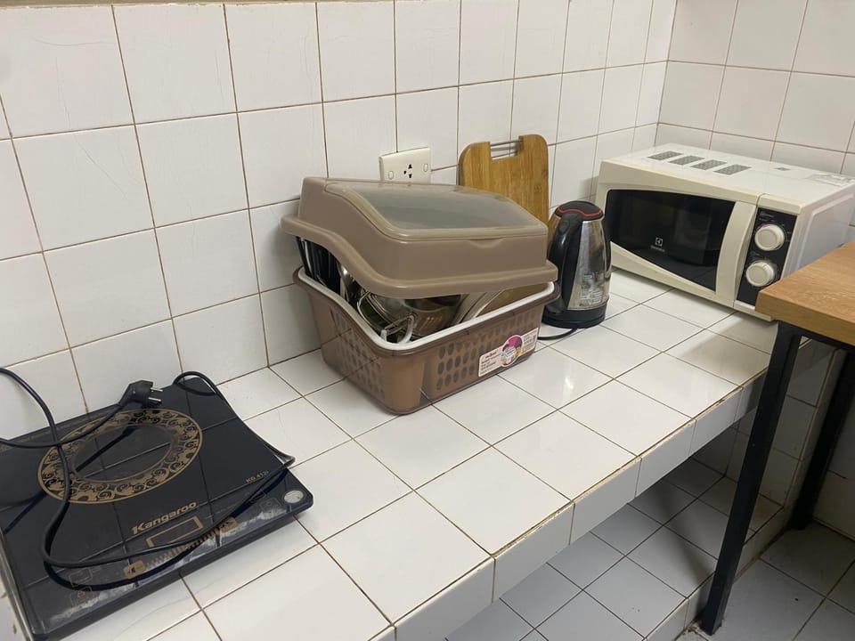 Kitchen or kitchenette, stove