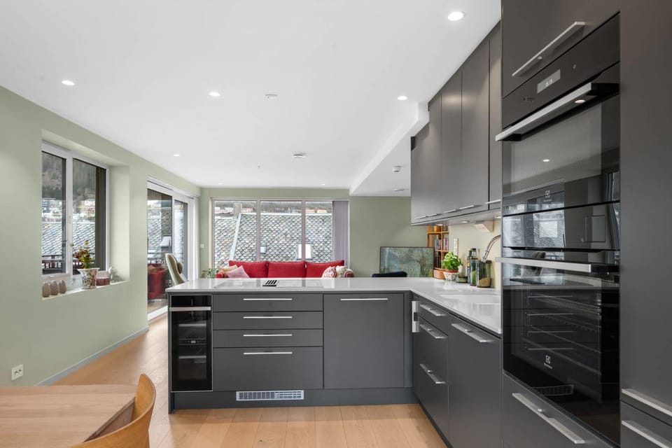 Kitchen or kitchenette, dishwasher, oven, stove