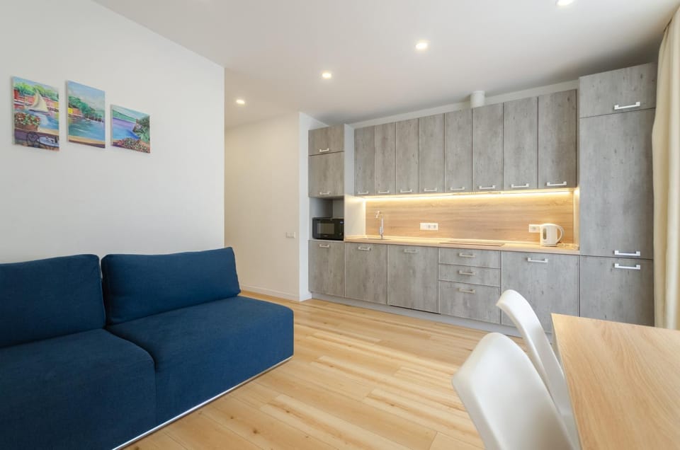 Living room, Seating area, microwave, kitchen