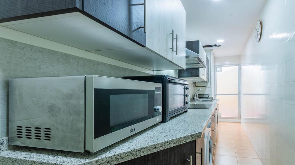 Kitchen or kitchenette, oven, stove