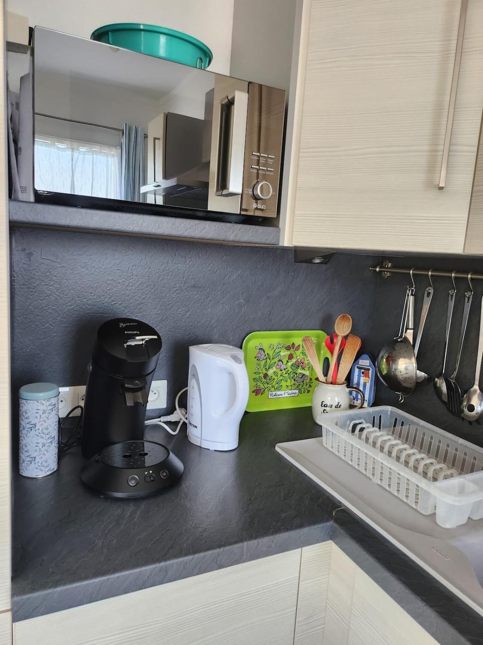 Kitchen or kitchenette, stove, toaster