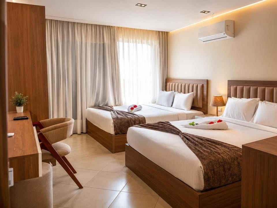 Bed, Living room, Photo of the whole room, Seating area, Bedroom, towels, air conditioner