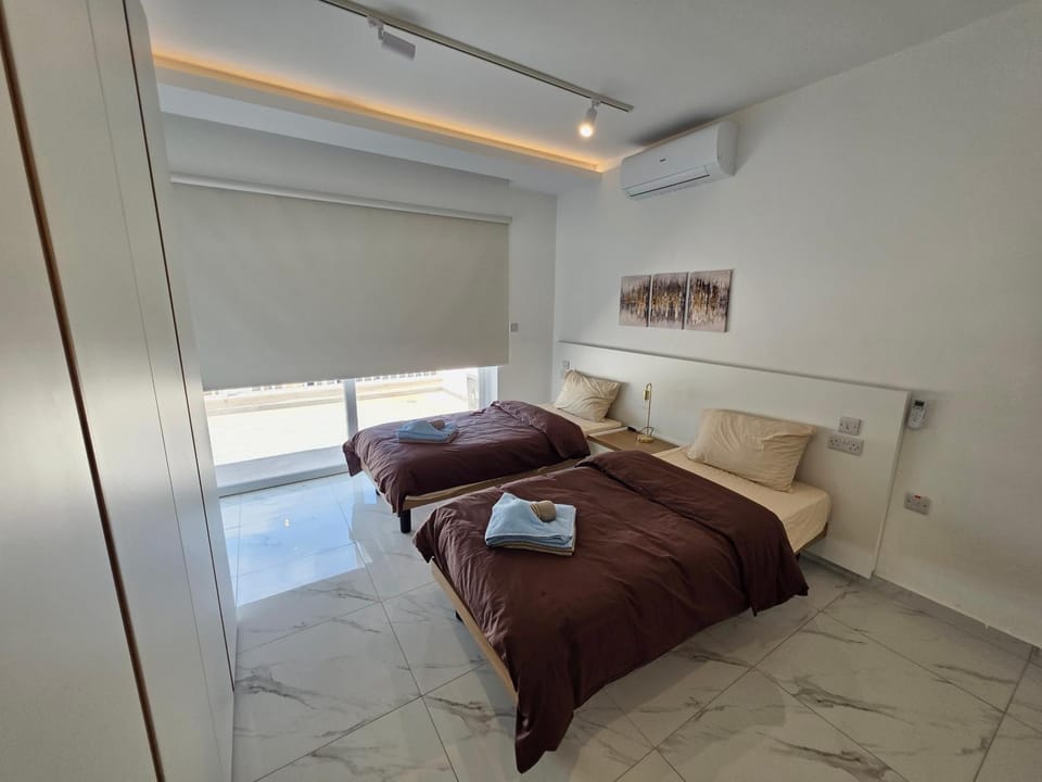 Bed, Photo of the whole room, Bedroom, towels, air conditioner