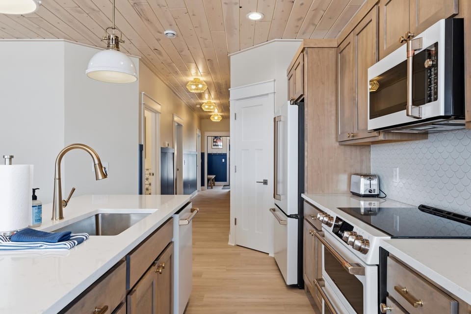 Kitchen or kitchenette, furniture, microwave, toaster