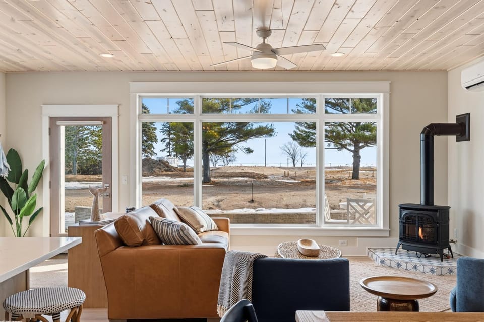 Day, Natural landscape, Living room, Seating area, fireplace, furniture, air conditioner